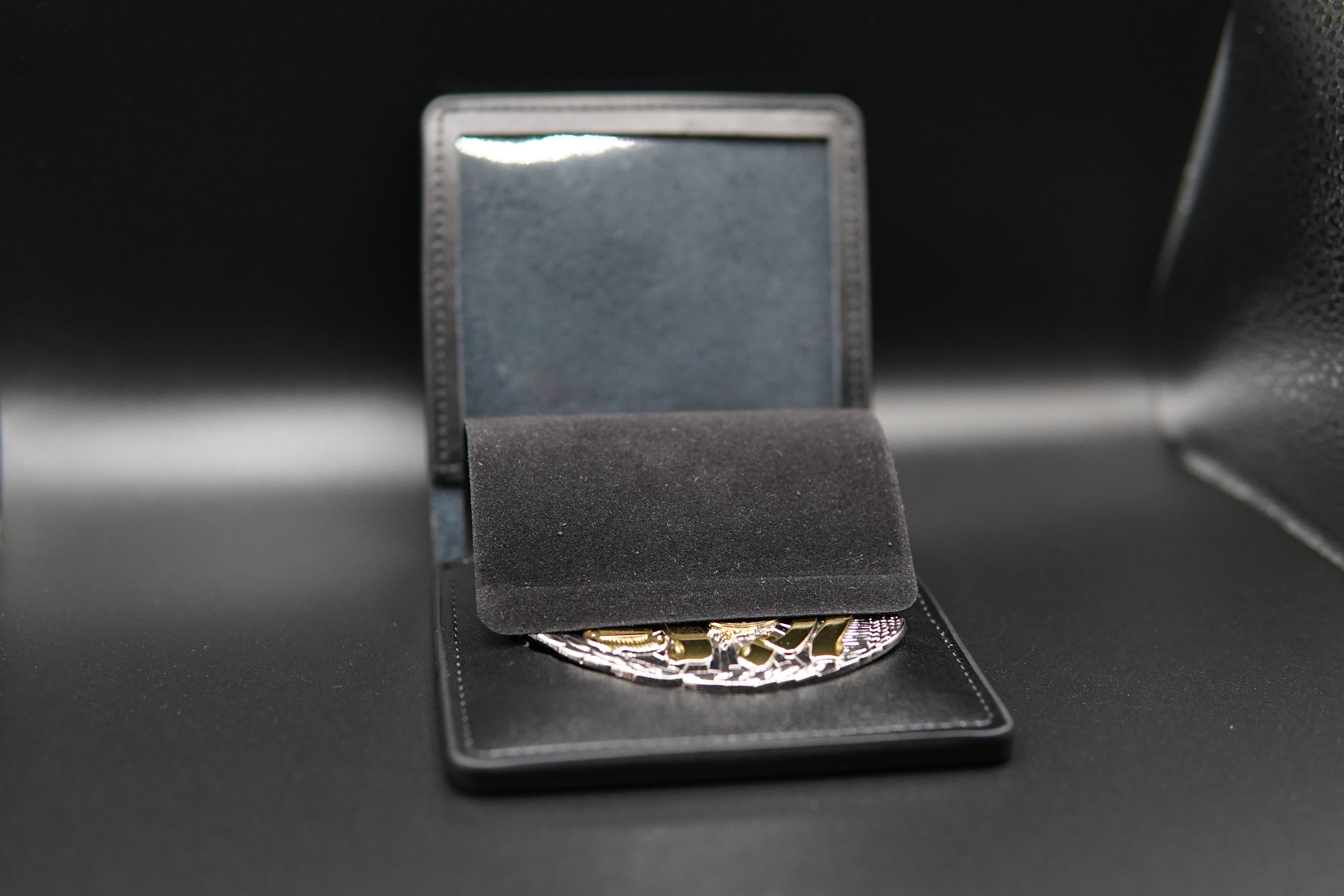Leather badge wallet with protective flap